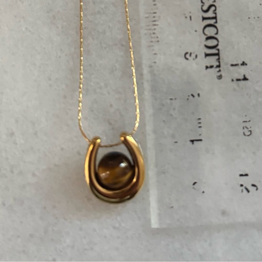 Gold Amber Tiger Eye Pendant Necklace
Brand New - Picture 4 of 4